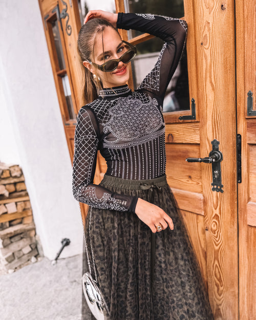 Body „Rebellin der Berge“